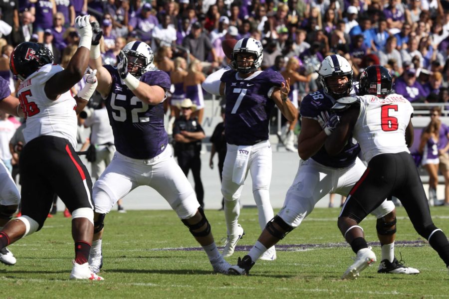 TCU quarterback Kenny Hill looks to pass against the Texas Tech defense. 
(Sam Bruton/TCU 360 staff photographer)