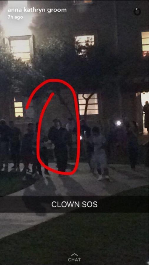 The clown was spotted after midnight wearing a white mask with red rimmed eyes and mouth. The person was walking around campus with two others who were not dressed as clowns.