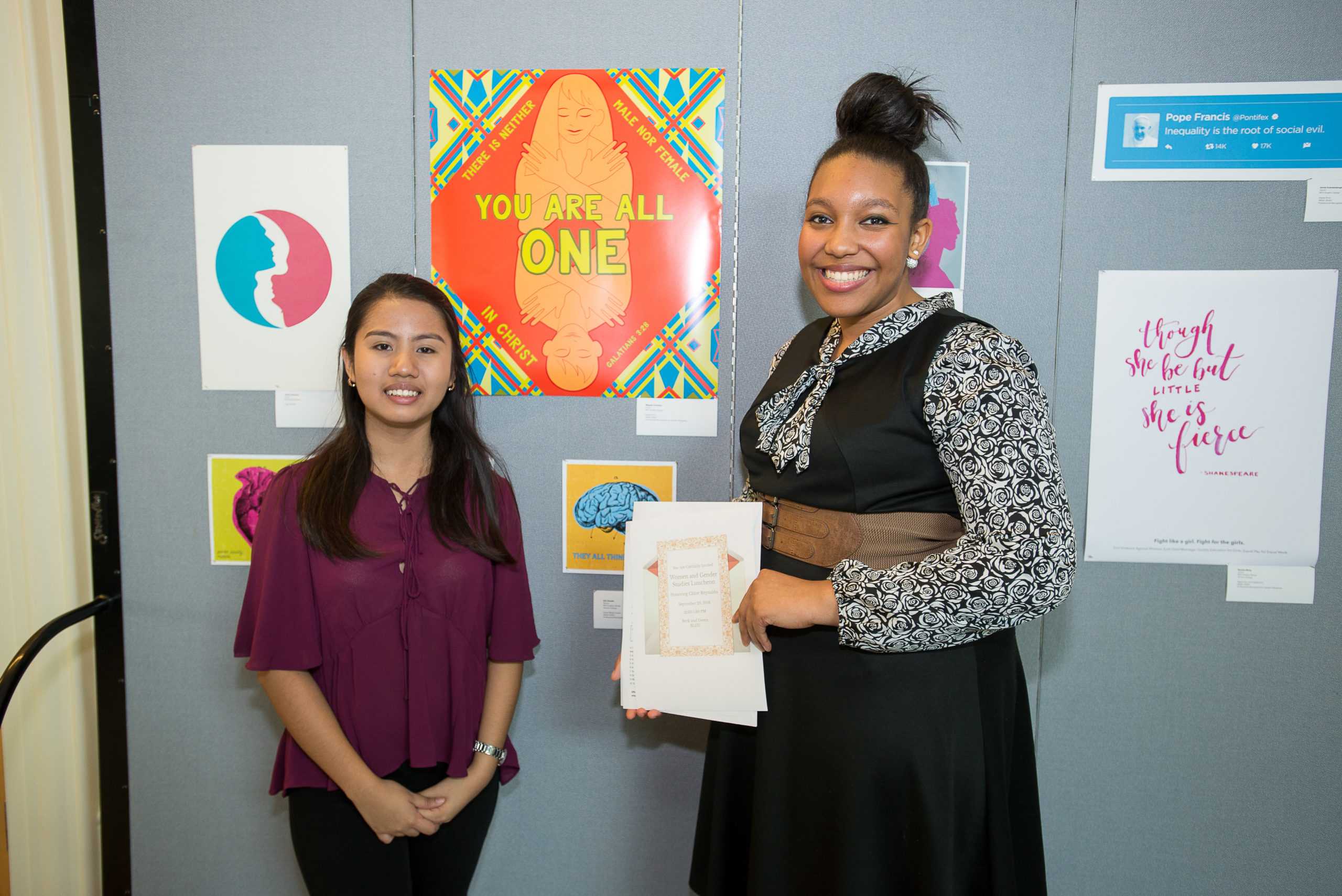 Chloe Reynaldo with first place winner Majesty Christian. Christian is Junior BFA Graphic Design student. Her artwork - "You Are All One" (Photo Courtesy - )