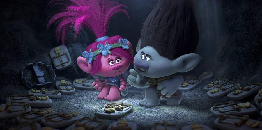 This image released by Dreamworks Animation shows characters Poppy, left, voiced by Anna Kendrick, and Branch, voiced by Justin Timberlake in a scene from Trolls. (DreamWorks Animation via AP)
