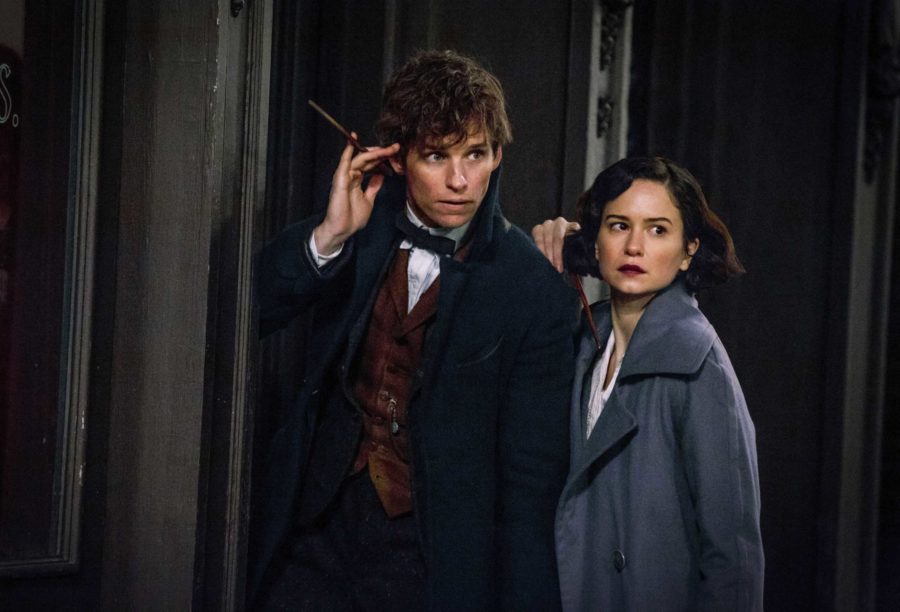 This image released by Warner Bros. Entertainment shows Eddie Redmayne, left, and Katherine Waterston in a scene from, Fantastic Beasts and Where to Find Them. (Jaap Buitendijk/Warner Bros. via AP)