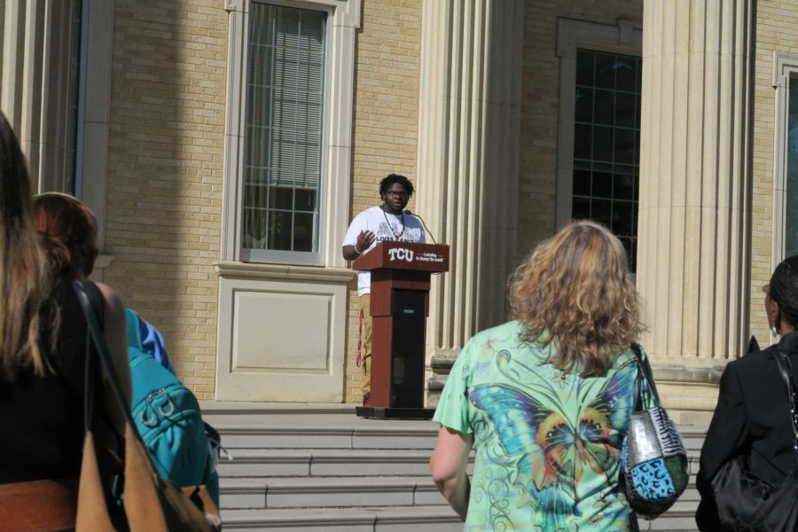 Elijah Herring, a member of SOCC, spoke out at the speak out as students and faculty stopped and passed by to listen. (Tamera Hyatte/TCU 360)