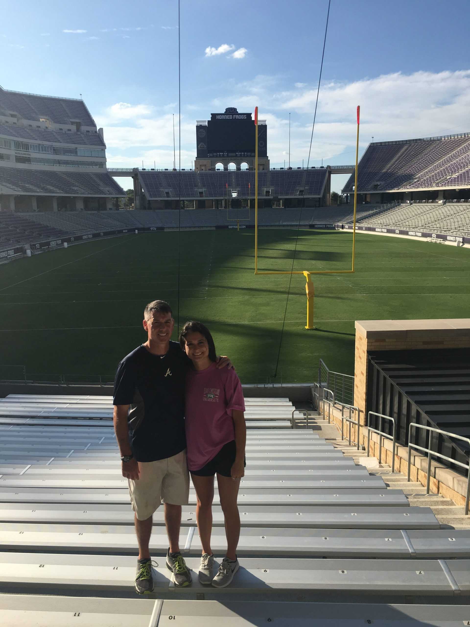 Shane and Taylor Kimbrough pose in Amon G. Carter stadium (Photo courtesy Taylor Kimbrough). 
