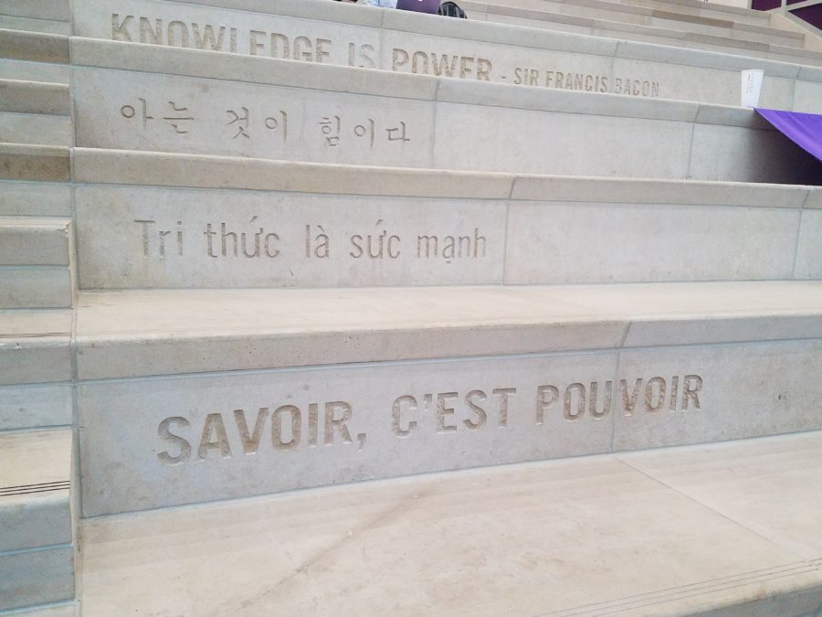 Steps at the library that repeat the same verse in a variety of languages.