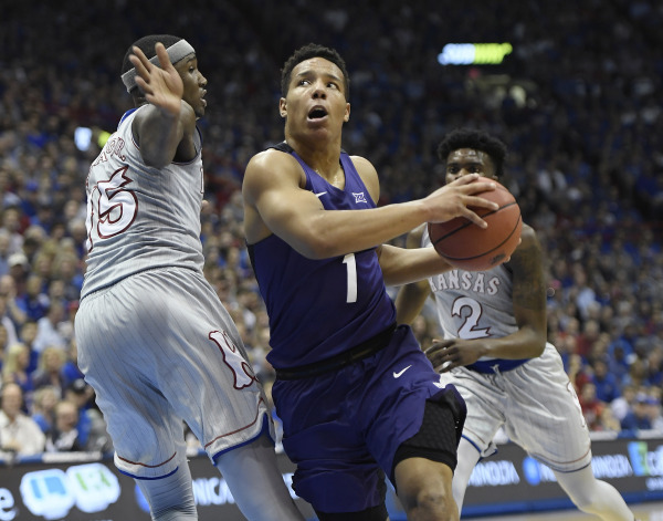 Desmond Bane drives to the hoop against Kansas. (Photo Courtesy of GoFrogs.com)