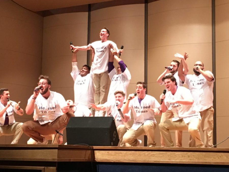Jackson Grosskopf is lifted into the air during a performance by The Horned Tones at the ICCA Quarterfinal Competition Saturday, February 18, 2017. 