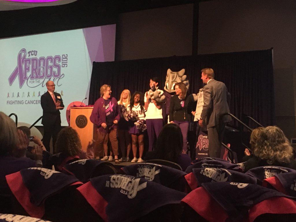 Frogs for the Cure presents Cancer Care services with a check for $25,000 (Makenzie Stallo/TCU360).