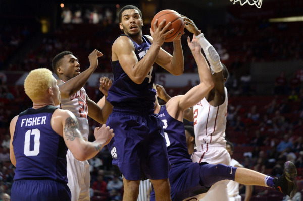 TCU forward Kenrich Williams pulls down a rebound against Oklahoma on Saturday. (Photo Courtesy of GoFrogs.com)