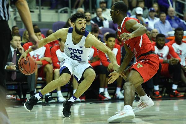 Alex Robinson Jr. dribbles past a defender in TCUs 66-59 win over Fresno State.  (Photo Courtesy of GoFrogs.com)