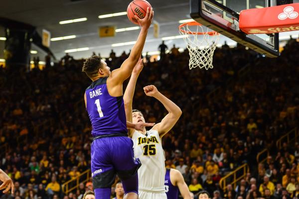 TCU guard Desmond Bane drives to the hoop during a 94-92 win over Iowa on Sunday (Photo Courtesy of GoFrogs.com)