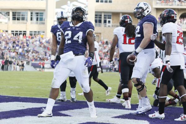 TCU running back Trevors Johnson celebrates a touchdown against Texas Tech. (Photo Courtesy of GoFrogs.com)
