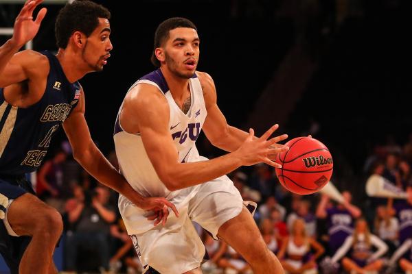 TCU guard Kenrich Williams looks to make a pass against Georgia Tech in the NIT Championship Game. (Photo Courtesy of GoFrogs.com