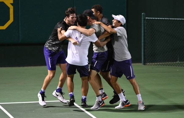 The TCU Men's Tennis team celebrates after clinching back-to-back Big 12 titles with a 4-1 win over Baylor on April 19, 2017 (GOFROGS.com)