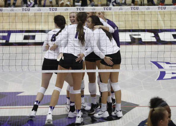 TCU volleyball celebrates winning a point in regular-season finale against West Virginia. (Photo courtesy of GoFrogs.com)