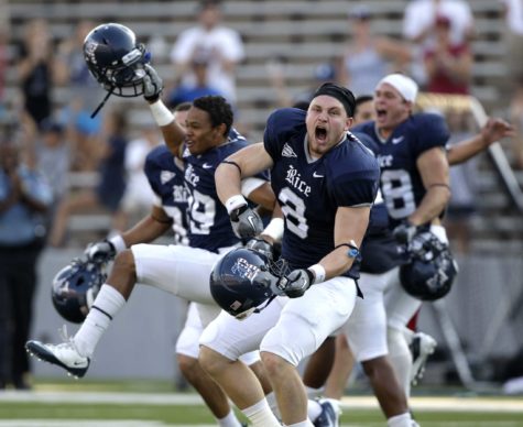 Rices Brent Hotard (8) celebrates with teammates after Rice blocked a field goal attempt by Purdue on the final play of an NCAA college football game Saturday, Sept. 10, 2011, in Houston. Rice won 24-22. (AP Photo/David J. Phillip)