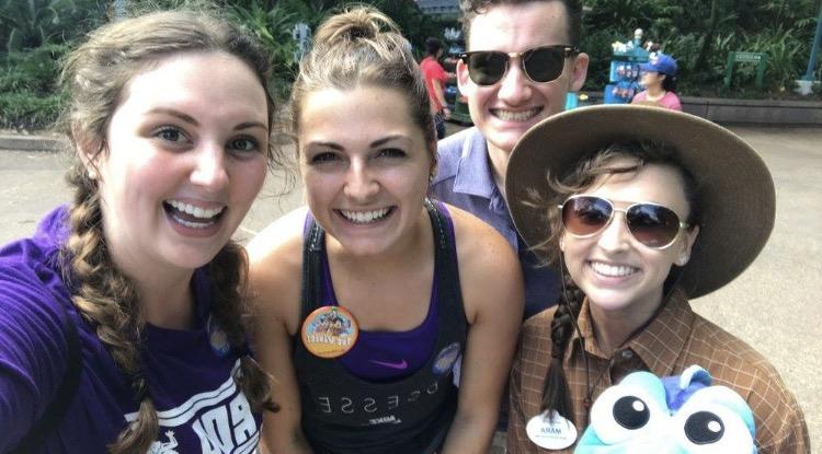 Left to right: TCU alumni Hannah Wright, Maddie Curran, Nathan Laska and Mara Frumkin posing for a group photo at Walt Disney World. All four are members of the Disney College Program. Photo: Hannah Wright