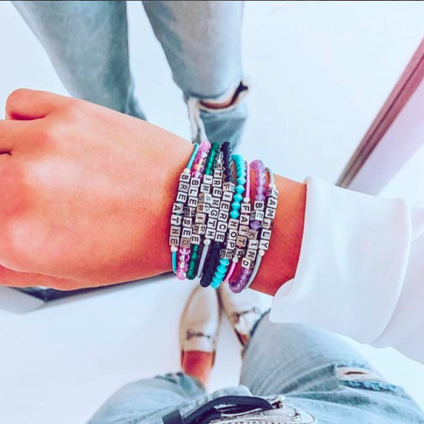 Little Words Project bracelets as seen on the companys Instagram, @littlewordsproject_tcu. Photo taken by Katey Reiff.  