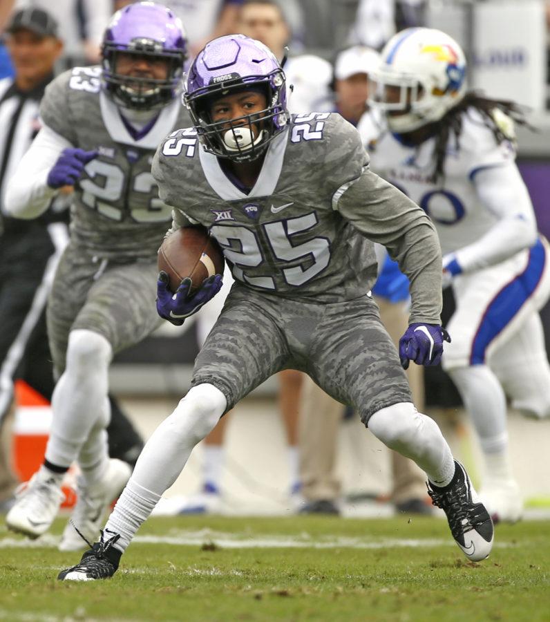 TCU s KaVontae Turpin (25) returns a punt for a touchdown against Kansas in the first quarter of an NCAA college football game Saturday, Nov. 14, 2015, in Fort Worth, Texas. (AP Photo/Ron Jenkins)