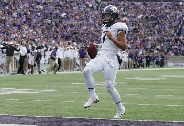 TCU quarterback Kenny Hill jogs into the end zone to give the Horned Frogs a 7-0 lead over Kansas State. Photo courtesy of GoFrogs.com