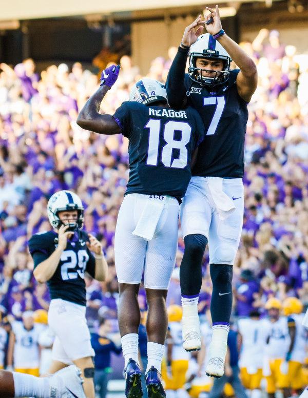 TCU+quarterback+Kenny+Hill+chest+bumps+wide+receiver+Jalen+Reagor+after+their+45-yard+touchdown+connection.+Photo+courtesy+of+GoFrogs.com
