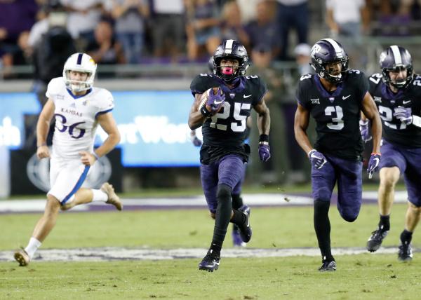 TCU wide receiver KaVontae Turpin returns a Kansas punt 90 yards for a touchdown Saturday in. a 43-0 victory over the Jayhawks. Photo courtesy of GoFrogs.com