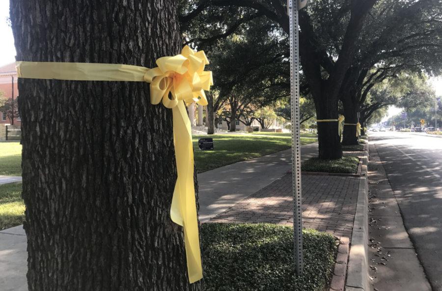 TCU+SVA+lined+the+trees+on+University+Drive+with+yellow+ribbons+for+Veterans+Day+on+Nov.+10%2C+2017.+%28Photo+courtesy+of+Lana+Wynn%29