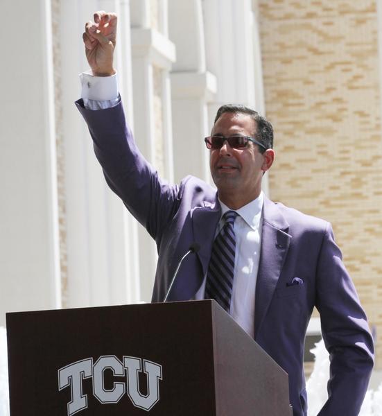 Chris Del Conte gives a speech outside of Amon G. Carter Stadium. 