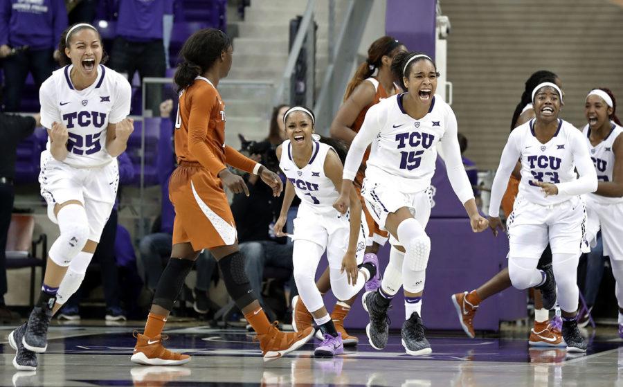TCUs Kianna Ray (25), Toree Thompson (1), Jayde Woods (15) and Adeola Akomolafe (33) celebrate the teams 79-77 win over Texas in an NCAA college basketball game Wednesday, Jan. 10, 2018, in Fort Worth, Texas. (AP Photo/Tony Gutierrez)