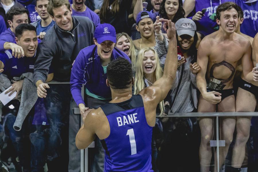 TCU guard Desmond Bane celebrates the Horned Frogs victory over No. 7 West Virginia with the TCU student section. Photo by Cristian ArguetaSoto