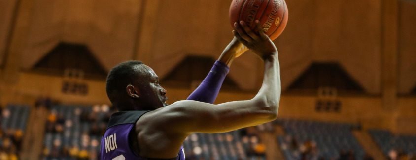 Feb 12, 2018; Morgantown, WV, USA; TCU Horned Frogs forward Kouat Noi (12) shoots the ball during the first half against the West Virginia Mountaineers at WVU Coliseum. Mandatory Credit: Ben Queen-USA TODAY Sports