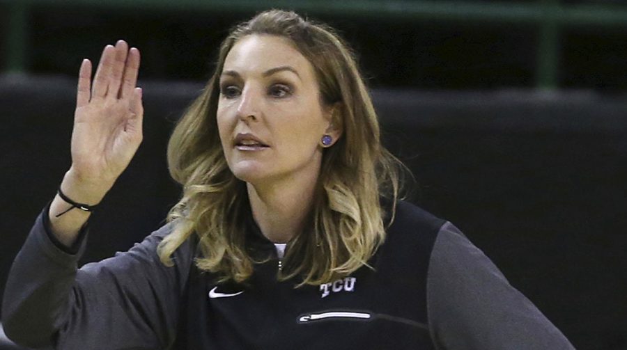 TCU coach Raegan Pebley calls a play for her team during the first half against Baylor in an NCAA college basketball game Saturday, Feb. 10, 2018, in Waco, Texas. (AP Photo/Jerry Larson)