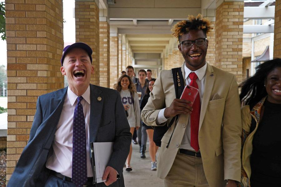 Chancellor Victor Boschini accompanies Tristian Brooks to class as part of this years big switch. (Photo by Shane Battis.)