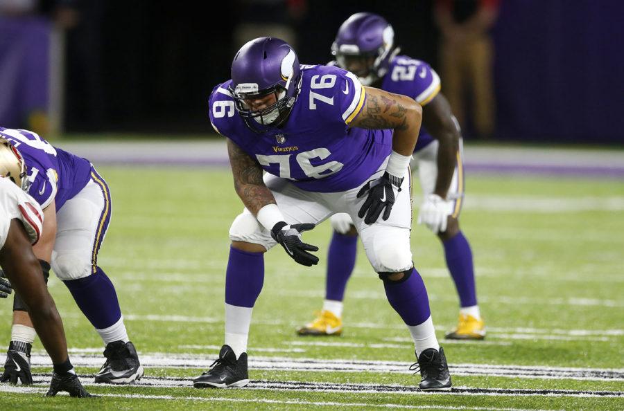Minnesota Vikings offensive lineman Aviante Collins gets set on the line during the second half of an NFL preseason football game against the San Francisco 49ers, Sunday, Aug. 27, 2017, in Minneapolis. (AP Photo/Jim Mone)