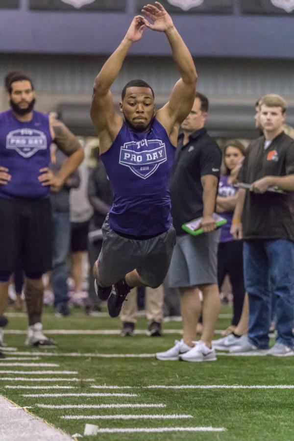 TCU offensive lineman Joseph Noteboom participates in the broad jump drill for NFL Scouts at TCUs Pro Day. Photo by Cristian ArguetaSoto