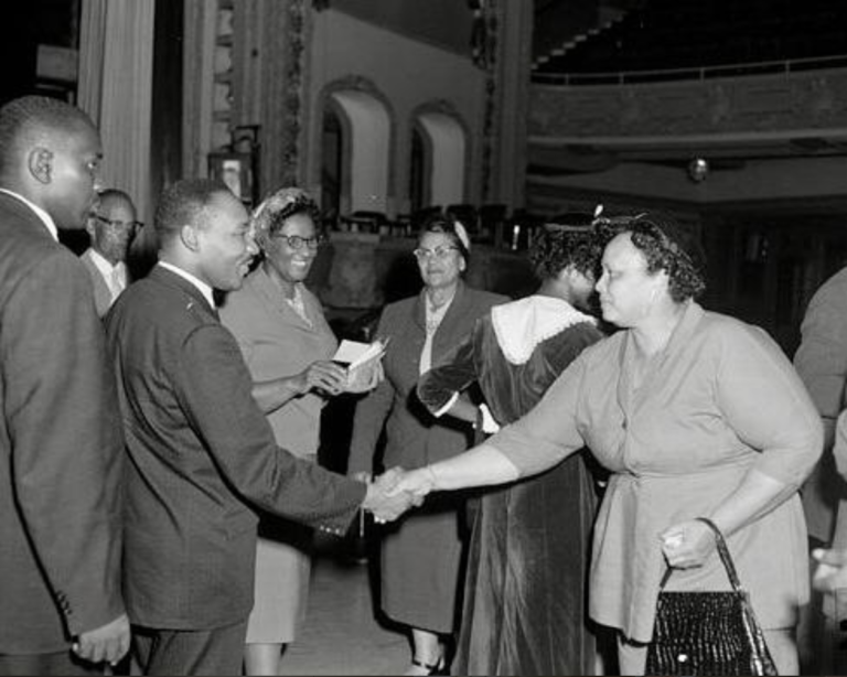 Martin Luther King Jr. and Vada Felder smiling and standing directly right of King at the Majestic Theater on Oct. 22. (Photo courtesy of Brite Divinity School.)