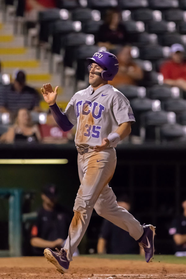 A.J. Baltas first Big 12 Championship was highlighted by his bases-clearing double. Photo by Cristian ArguetaSoto