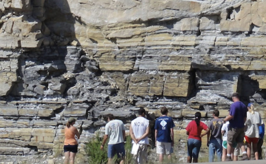 Students on a field trip study rock formations (photo courtesy of sgee.tcu.edu)