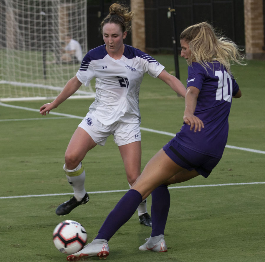 Tayla Christensen puts in a cross against Stephen F. Austin on August 24, 2018. Photo by Jack Wallace.