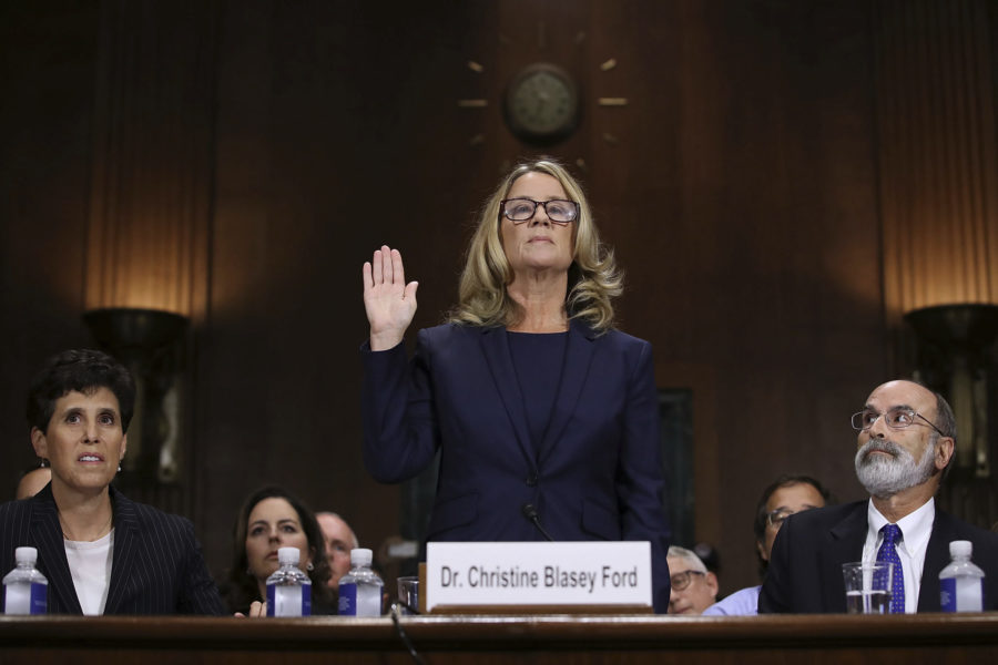 Christine+Blasey+Ford+is+sworn+in+before+the+Senate+Judiciary+Committee%2C+Thursday%2C+Sept.+27%2C+2018+in+Washington.+Her+attorneys+Debra+Katz+and+Michael+Bromwich+watch.+%28Win+McNamee%2FPool+Image+via+AP%29