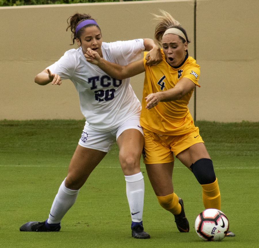 First-year Maddie Warren fights for the ball. Photo by Jack Wallace