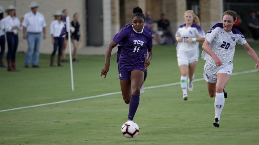 Messiah Bright dribbles down the field against Stephen F. Austin on August 23, 2018. Photo courtesy of GoFrogs.com.
