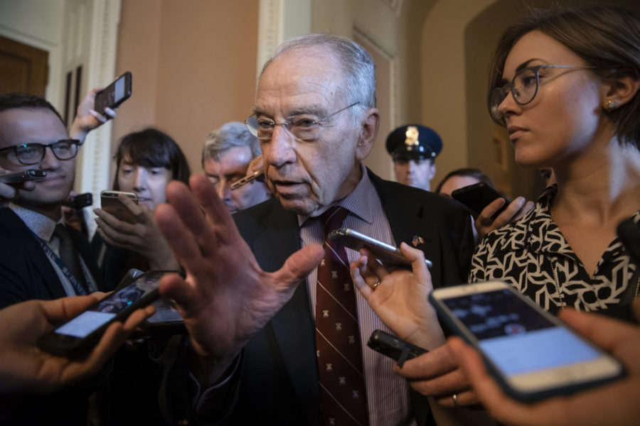 Senate Judiciary Committee Chairman Chuck Grassley, R-Iowa, talks to reporters as he emerges from a meeting with Senate Majority Leader Mitch McConnell, R-Ky., after the Republican leaders agreed to delay a final vote on Supreme Court nominee Brett Kavanaugh to allow time for an investigation by the FBI of the sexual misconduct allegations against him, at the Capitol in Washington, Friday, Sept. 28, 2018. (AP Photo/J. Scott Applewhite)