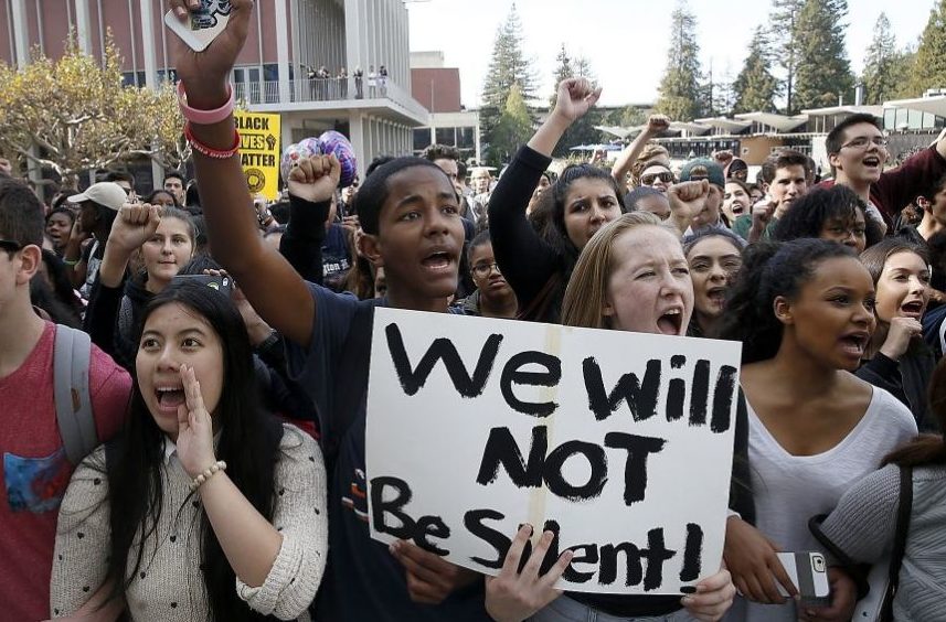 Millennials protest at a Black Lives Matter rally. 
credit: DC Report