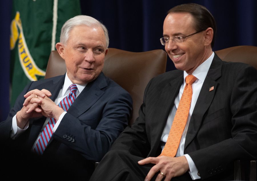 US Attorney General Jeff Sessions and Deputy Attorney General Rod Rosenstein (R) attend the Second Annual Attorney Generals Award for Distinguished Service in Policing at the Department of Justice in Washington, DC, September 18, 2018.SAUL LOEB/AFP/Getty Images