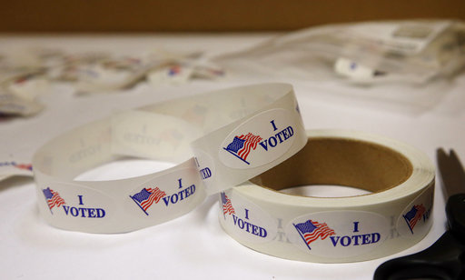 I Voted stickers await voters at the Oklahoma County Board of Elections, Thursday, June 21, 2018, in Oklahoma City, as early, in-person absentee voting has begun at county election boards across Oklahoma ahead of Tuesdays statewide primary election. (AP Photo/Sue Ogrocki)