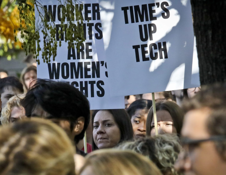 Google employees, who walked off the job to protest the internet companys lenient treatment of executives accused of sexual misconduct, listen to speakers during a protest rally on Thursday, Nov. 1, 2018, in New York. Employees staged walkouts at offices from Tokyo to Singapore to London. (AP Photo/Bebeto Matthews)