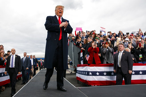 President Donald Trump arrives to speak at a campaign rally at Huntington Tri-State Airport, Friday, Nov. 2, 2018, in Huntington, W.Va. (AP Photo/Evan Vucci)