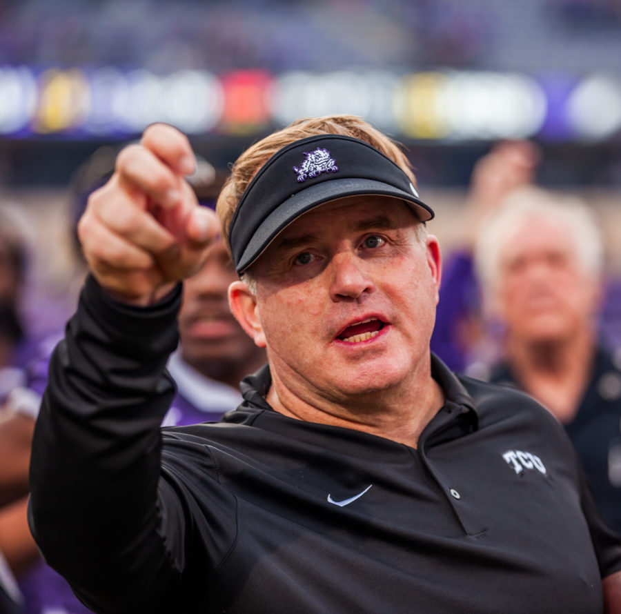 Gary Patterson throws up the horns after a victory over Kansas State. Photo by Cristian ArguetaSoto.