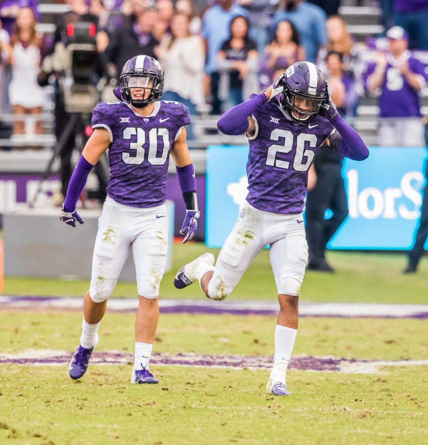 Garret Wallow and Vernon Scott celebrate a missed Kansas State field goal attempt. Photo by Cristian ArguetaSoto.