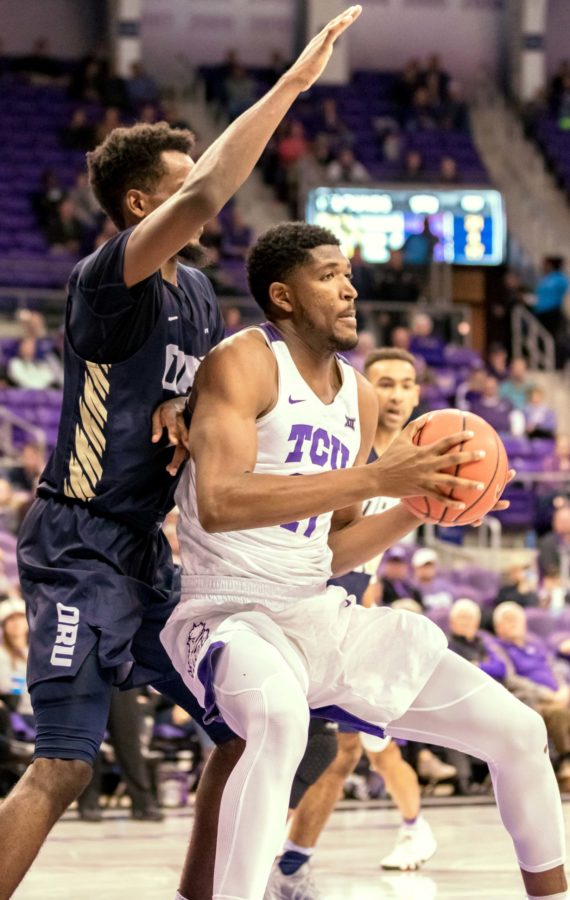 TCU center Kevin Samuel backs down an Oral Roberts defender in the post en route to his first double-double. Photo by Cristian ArguetaSoto.